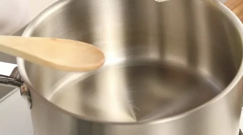 Diced bacon, onions and pepper being fried Stock Footage 24657901