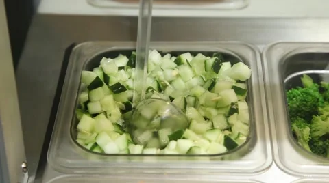 Diced cucumber on a food display Stock Footage 41452048