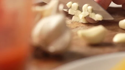Diced garlic on a chopping board. Stock Footage 266900459