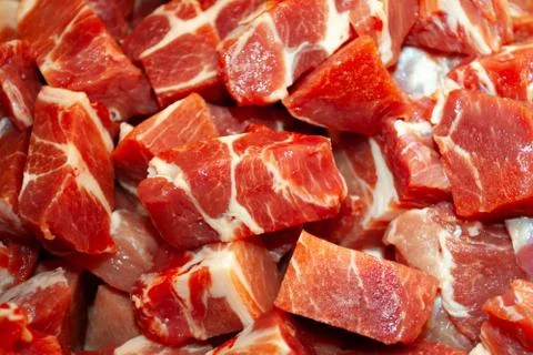 Diced or cubed raw beef steak Stock Photos