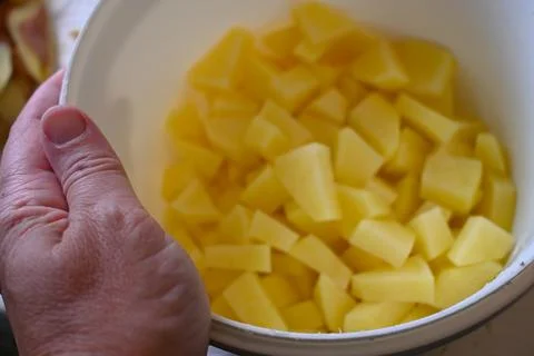 Diced Raw Potatoes Close-Up, Budget Food Ingredient Concept Stock-Fotos