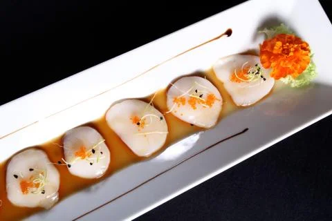 Diced scallops with sauce Stock-Fotos