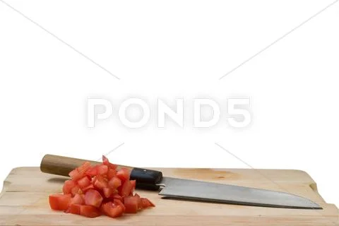 Diced tomato and knife Stock Photos