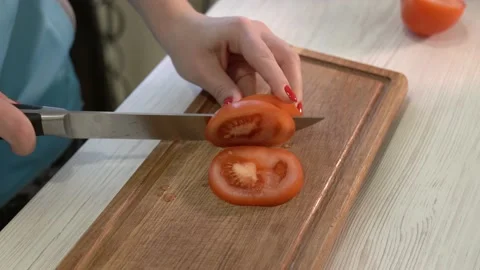 Diced up tomatoes in the kitchen Stock Footage 231720378