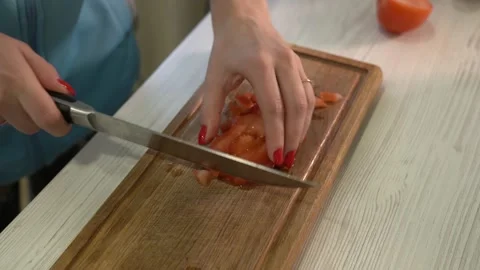 Diced up tomatoes in the kitchen Stock Footage 231720398