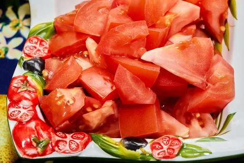 Diced tomatoes on a plate Stock Photos