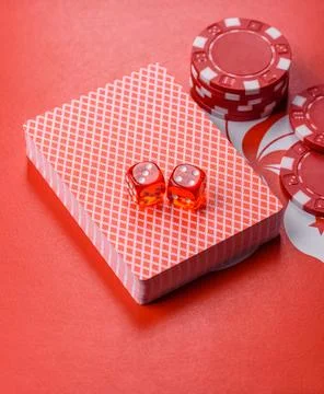 Dices and chips on a table, a gambling game of poker. Dices and chips Photos