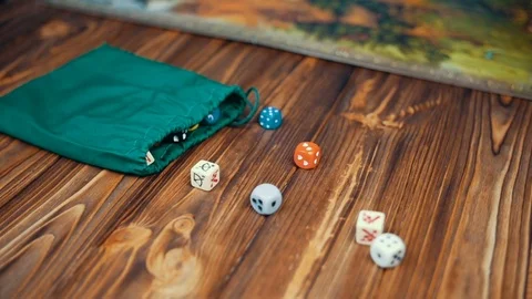 Dices Fall On a Wooden Table With Boardgame Stock Footage 72603115