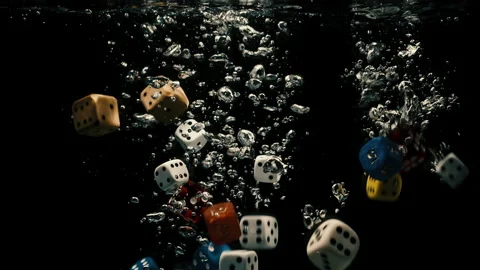 Dices falling slowly into water 스톡 동영상 130308682