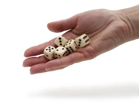 Dices on a hand Stock Photos