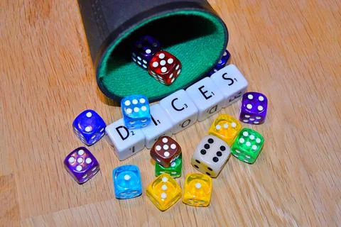 Dices on the table.... Stock Photos