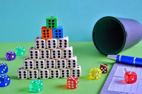 Dices on the table Stock Photos