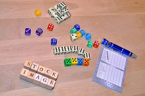 Dices on the table Stock Photos