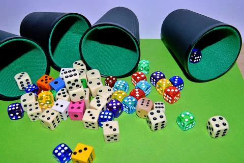 Dices on the table Stock Photos