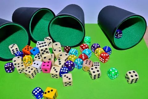 Dices on the table Stock Photos