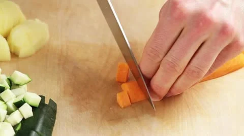 Dicing carrots Stock Footage 24662159