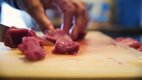 Dicing fresh meat in cubes Stock Footage 129256829