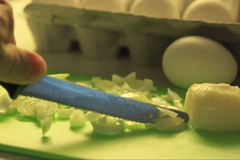 Dicing the onion with a knife Stock Footage 174740230
