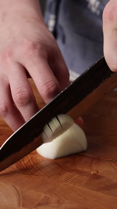 Dicing White Onion on Cutting Board Vertical Front View Видео 336570938