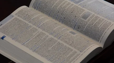 Dictionary close up with hands Stock Footage 51590660