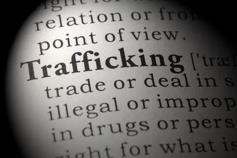 Dictionary definition of trafficking Stock Photos