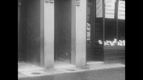 Diddums continues the chase with a policeman, she takes his hat, UK 1912 Video stock 136673525