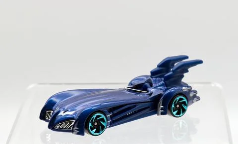 Die-cast model of the Hot Wheels Batmobile on white background. Stock Photos