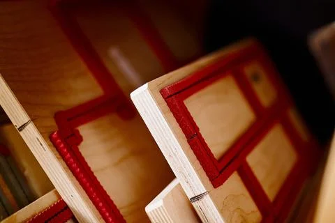 Die cutting dies prepared for precise cardboard box manufacturing in a creative Stock Photos