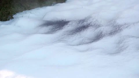 Diesel car start engine with big amount of smoke. Leaving black sign on the snow Stockbeeldmateriaal 137852683