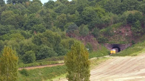 Diesel engine pulling classic steam train carriages Stock Footage 80321214