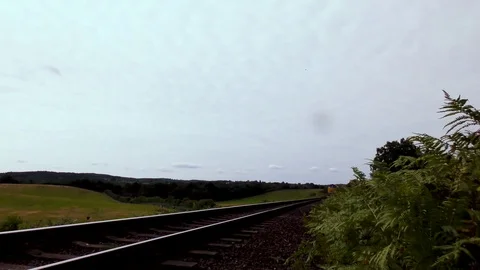 Diesel engine pulling classic steam train carriages Stock Footage 80331814