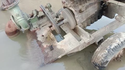 Diesel engine water pump operating at a mountain construction and mining sit Stock Photos