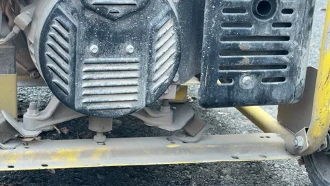 Diesel generator engine running and vibrating, powering welding machine on Stock Footage 337120903