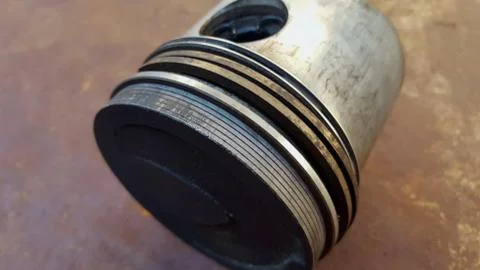 Diesel piston, the main driving component on the engine Stock Photos
