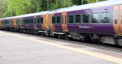 Diesel powered passenger railway train England UK Stock Footage 253876187
