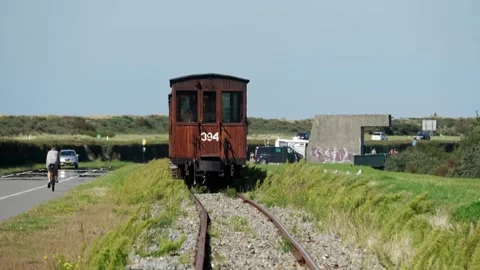 Diesel train leaving from the small station Vidéo 254801611