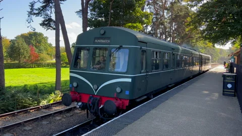 Diesel train leaving the station Stock Footage 220495307