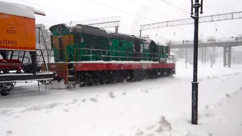 Diesel train motion in snow Stock Footage 70023596