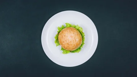 Diet And a Healthy Diet Instead of a Hamburger. 4K. Stop Motion. Stock Footage