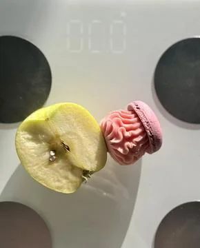 Diet Choice Between Fruit and Dessert Stock Photos