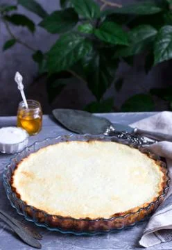 Diet cottage cheese casserole with lemon zest and vanilla, served with sour c Stock Photos