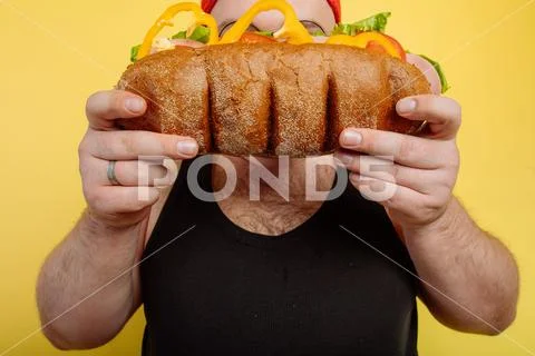Diet failure of fat man eating fast food Stock Photos