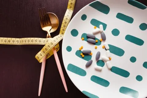 Diet Pills and Supplements Stock Photos