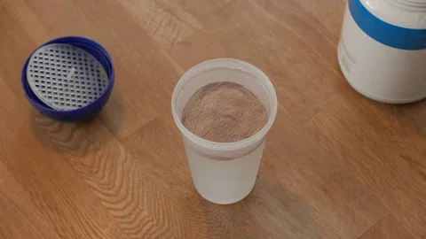 Diet shake powder gets mixed in a shaker. Protein shake, Diet shake. VLCD. Vídeos de archivo 73870338