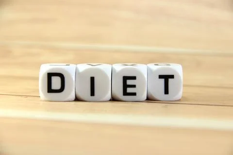 "DIET" text or message short word english letter on white block with brown .. Stock Photos