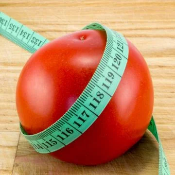 Diet using red tomatoes concept Stock Photos