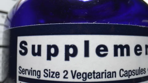 Dietary Supplement Bottle With Labels. Video stock 292867740