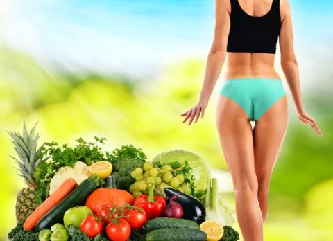 Dieting. balanced diet based on raw organic vegetables and fruits Stock Photos