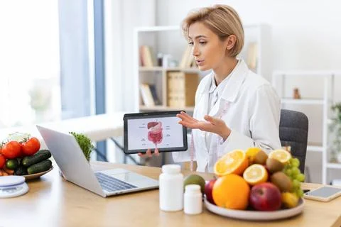 Dietitian Explaining Digestive System Stock Photos