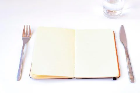 Diets concept. Open notebook on the table Stock Photos